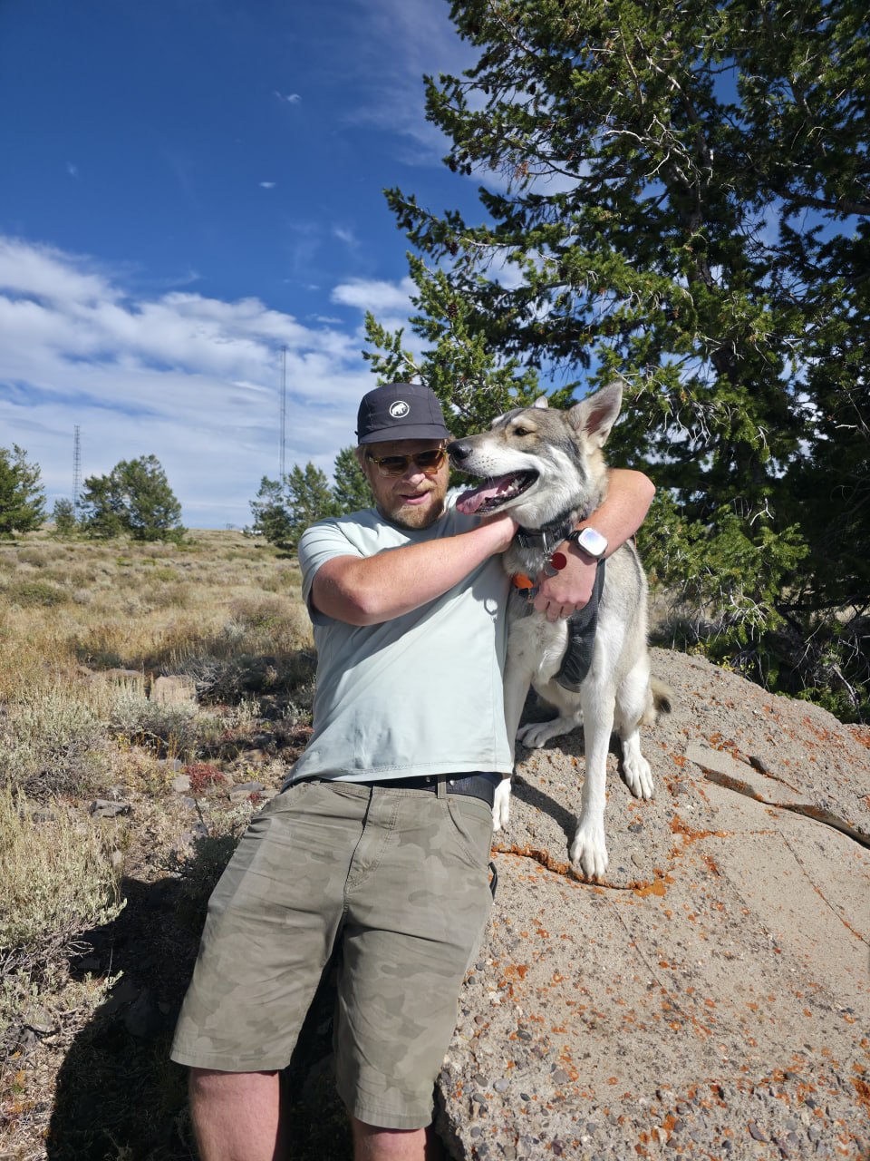 Ryan KF0VMF with Cerberus during a Grand Mesa repeater site visit